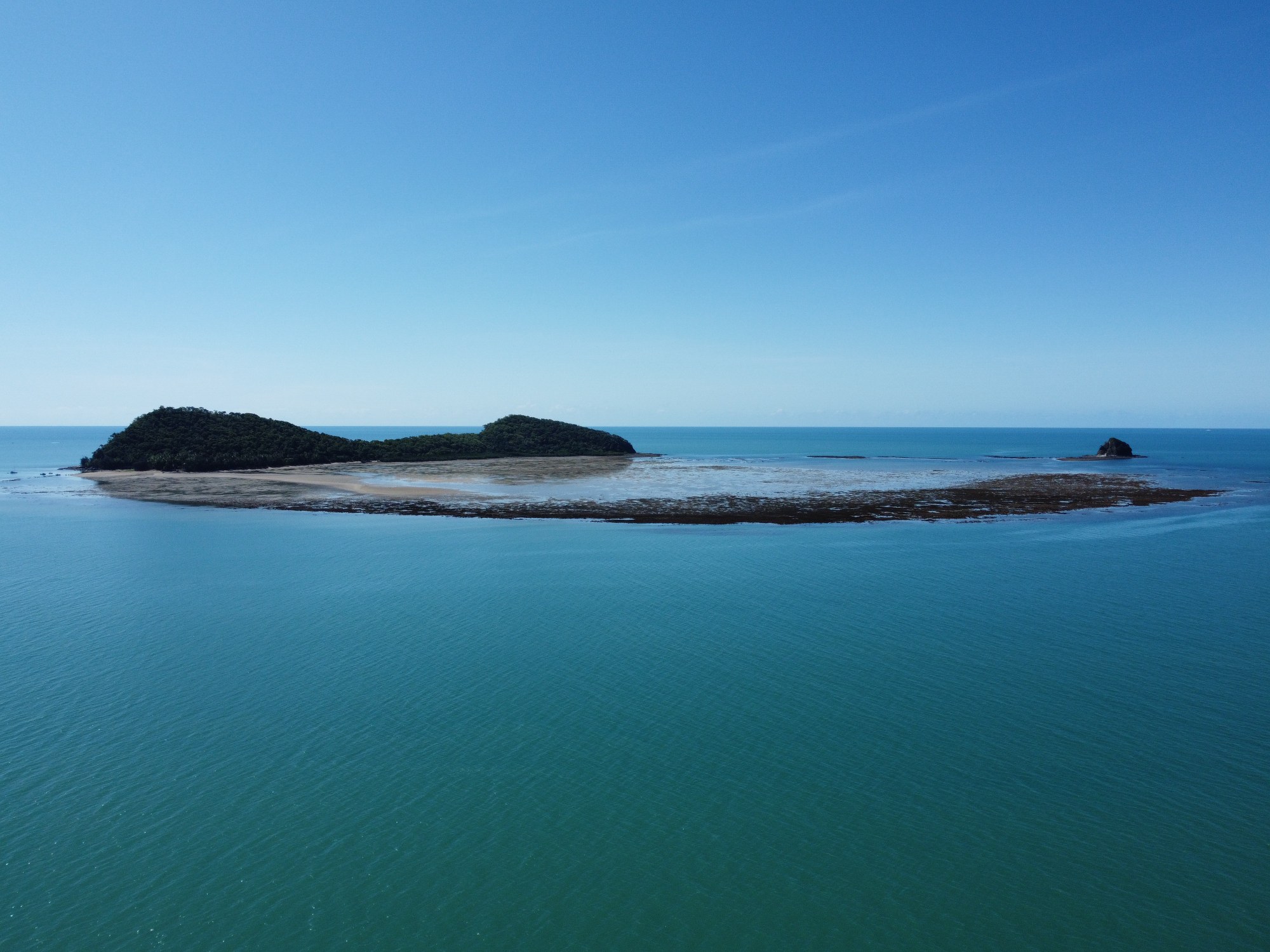 A picture of Double Island, Haycock Island, and Haycock Reef from a drone perspective